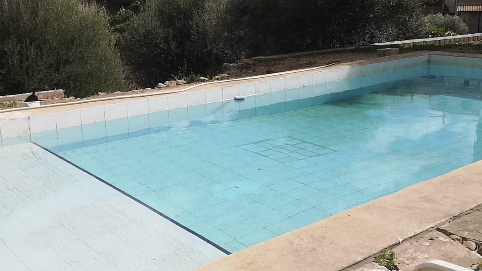 Ein Stück Mallorca mit Geschichte: Großes Stadthaus mit Parkgrundstück und Pool in Campanet
