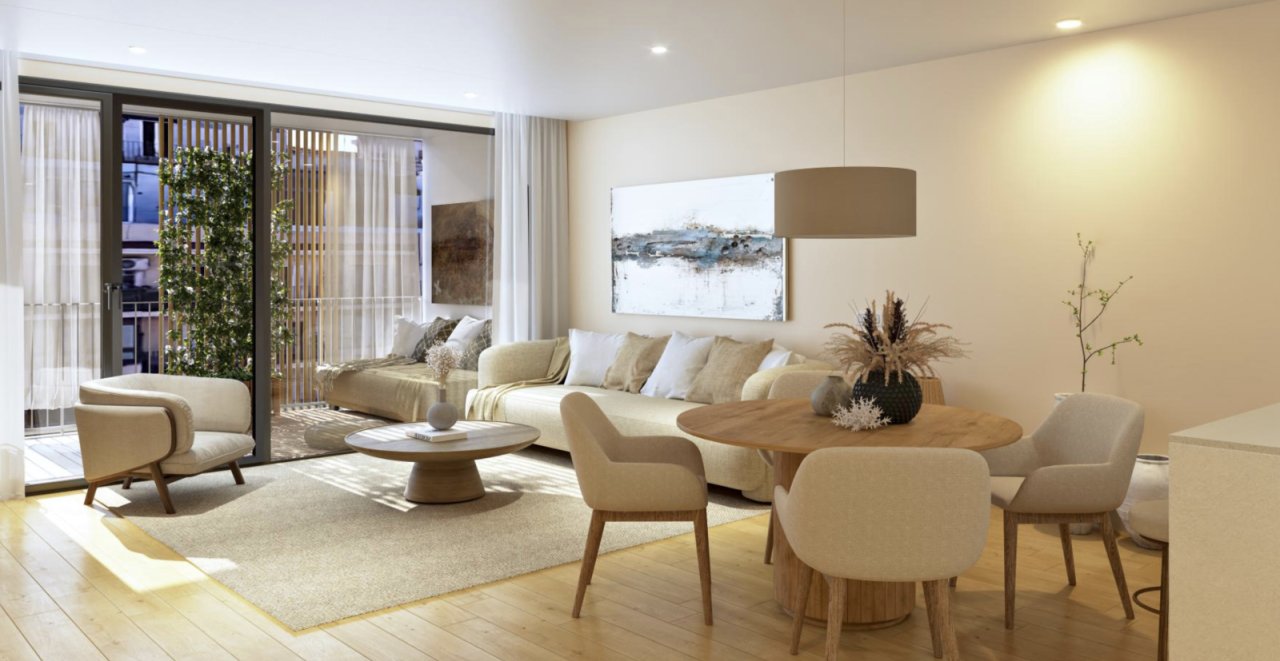 Wohnzimmer mit großflächiger Glasfront und nahtlosem Übergang zur Terrasse Wohnzimmer mit großflächiger Glasfront und nahtlosem Übergang zur Terrasse