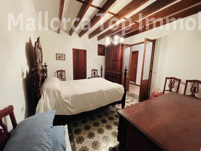 Schlafzimmer mit Holzbalkendecke und authentischem Charakter Schlafzimmer mit Holzbalkendecke und authentischem Charakter