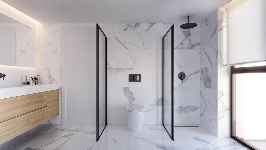 Modernes Badezimmer mit ebenerdiger Dusche, Marmor-Verkleidung und separatem WC-Bereich Modernes Badezimmer mit ebenerdiger Dusche, Marmor-Verkleidung und separatem WC-Bereich