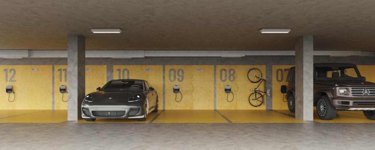 Moderne Tiefgarage mit Ladesäulen und praktischen Abstellflächen Moderne Tiefgarage mit Ladesäulen und praktischen Abstellflächen