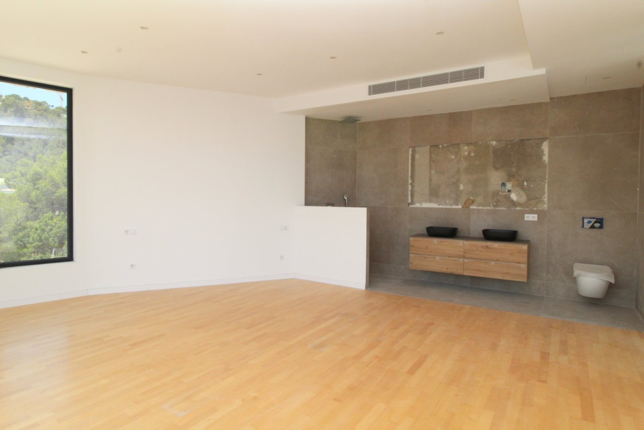 Schlafzimmer mit Bad en suite