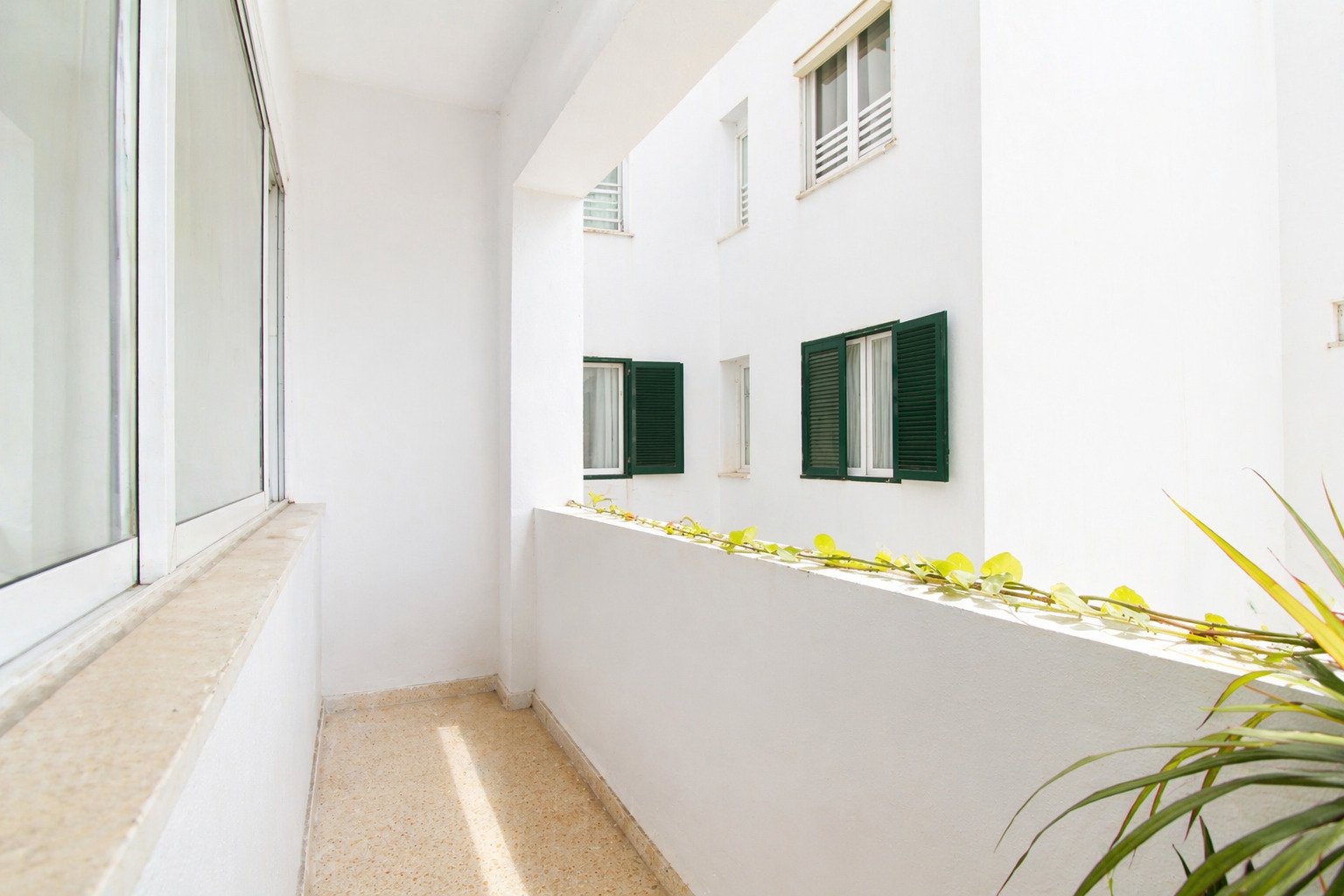 Elegant Apartment with Balcony and Rooftop Terrace – Urban Living Close to the Sea