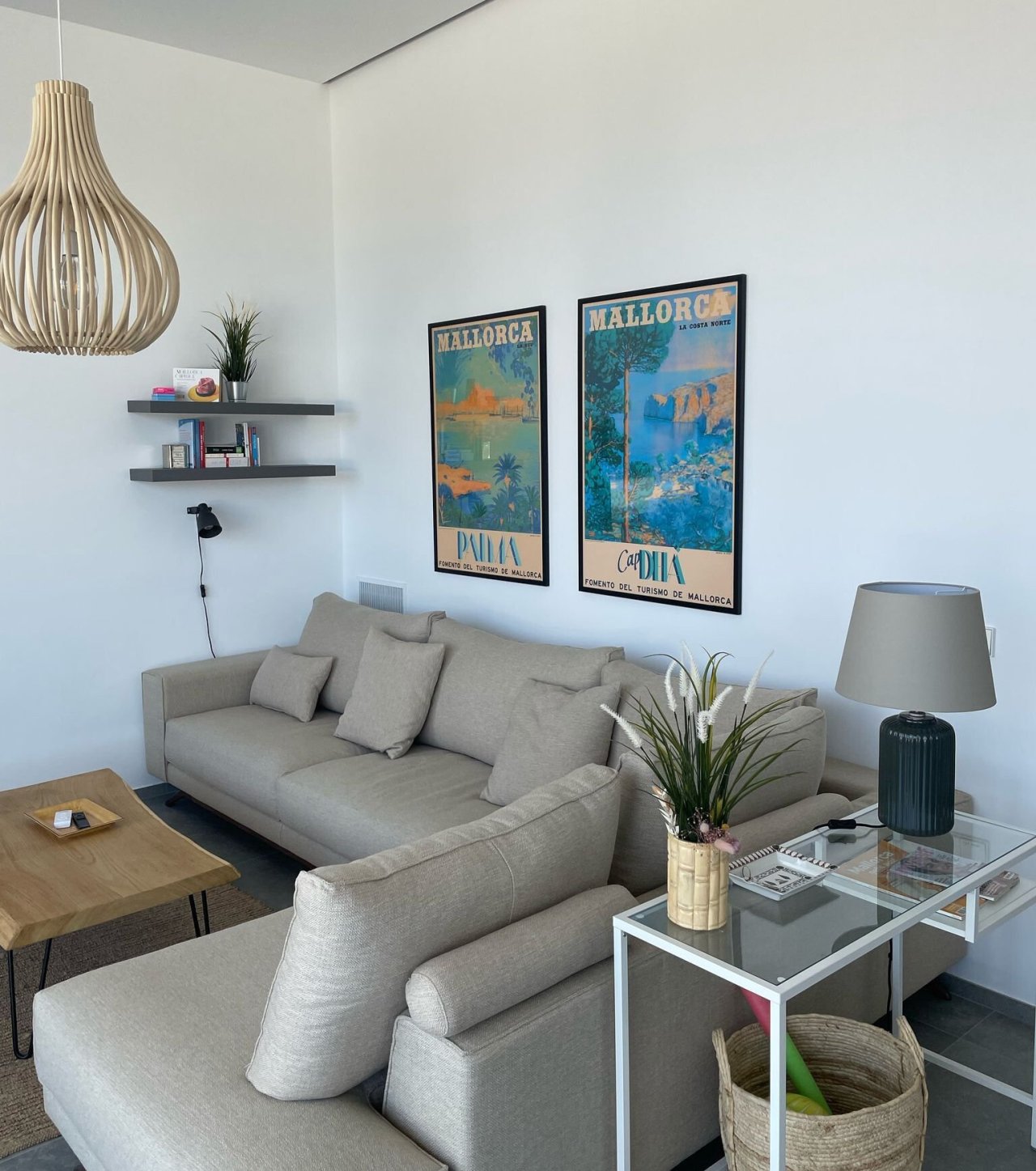 Bright living room with smart space utilization and practical wall installations Bright living room with smart space utilization and practical wall installations
