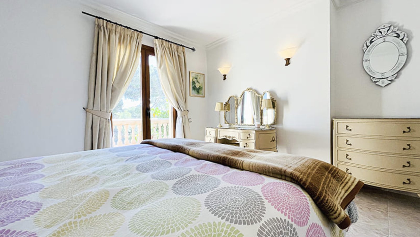 Bright bedroom with French balcony doors and generous ceiling height Bright bedroom with French balcony doors and generous ceiling height