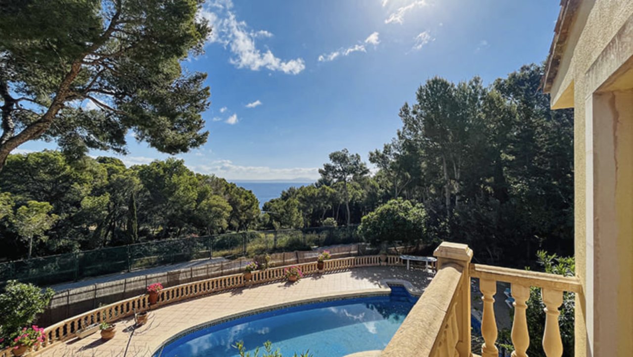 Pool area with sea view and elegant balustrade enclosure Pool area with sea view and elegant balustrade enclosure