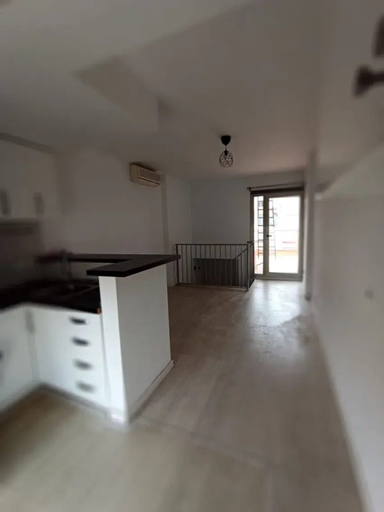 Open living concept with gallery and direct balcony access
