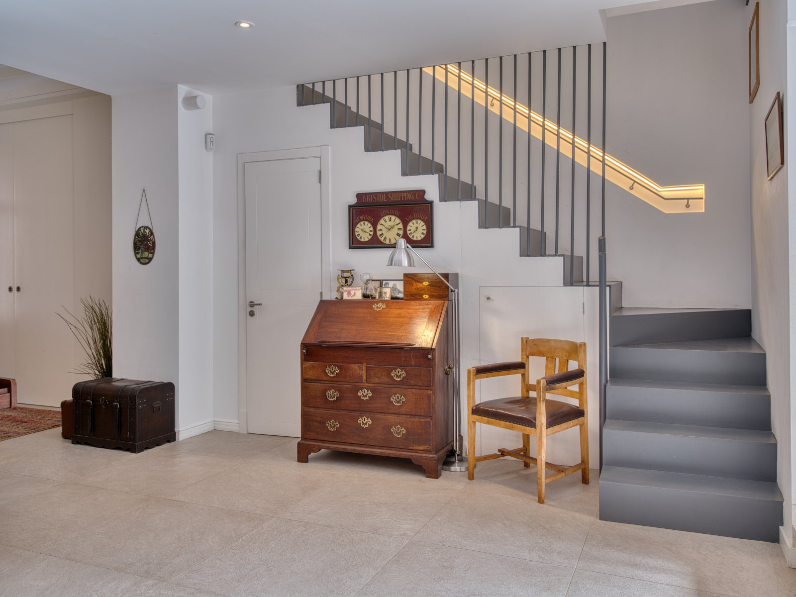 Bright foyer with elegant staircase, skylights, and well-designed flow Bright foyer with elegant staircase, skylights, and well-designed flow