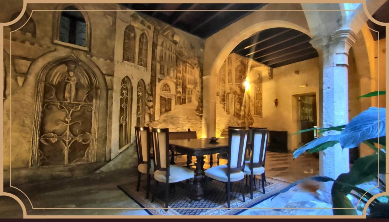 Authentic dining area with impressive stone vaults and distinctive column architecture Authentic dining area with impressive stone vaults and distinctive column architecture