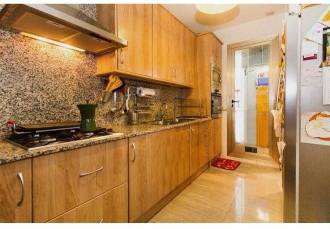 Modern kitchen with high-quality granite countertop and thoughtful storage Modern kitchen with high-quality granite countertop and thoughtful storage