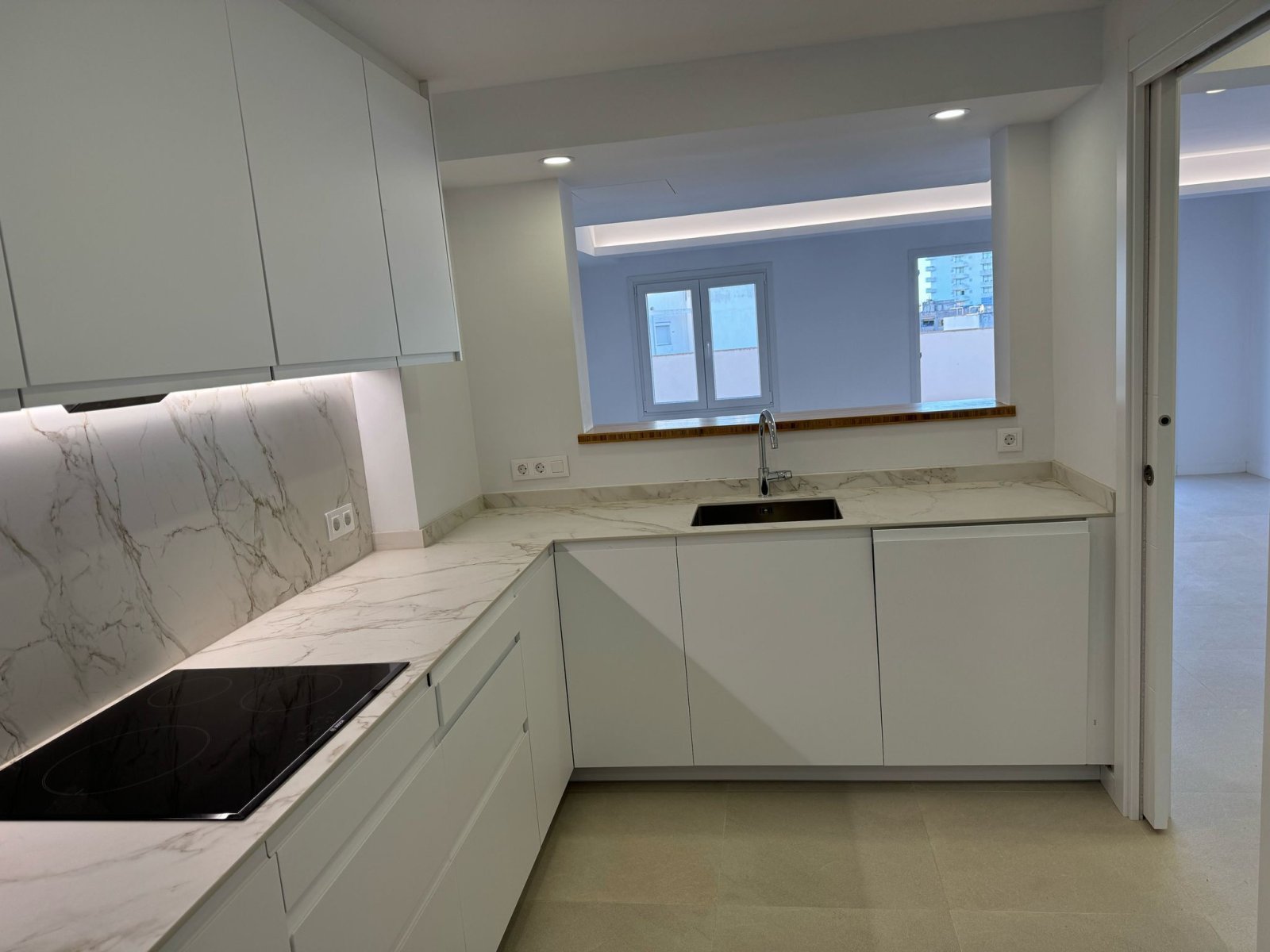 Modern kitchen with ergonomic layout and high-quality marble countertop