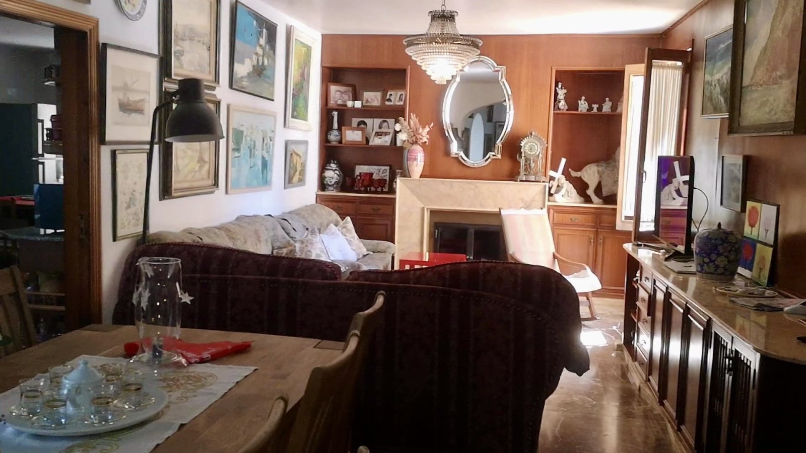 Open living and dining area with smart space utilization and versatile storage solutions