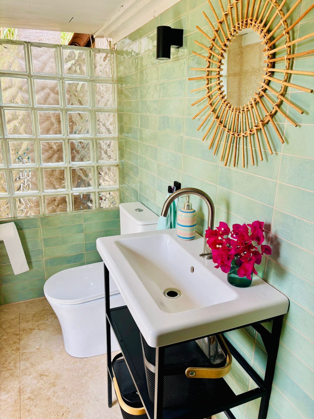 Elegant guest bathroom with glass block wall and modern washbasin Elegant guest bathroom with glass block wall and modern washbasin