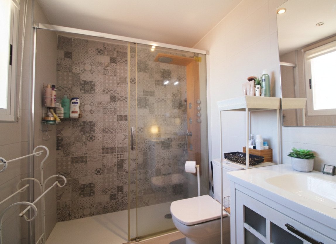 Modern bathroom with walk-in shower, double vanity, and smart storage solution