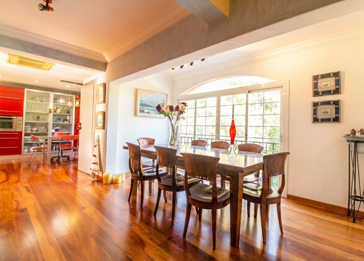 Open living and dining area with a harmonious connection and large window front