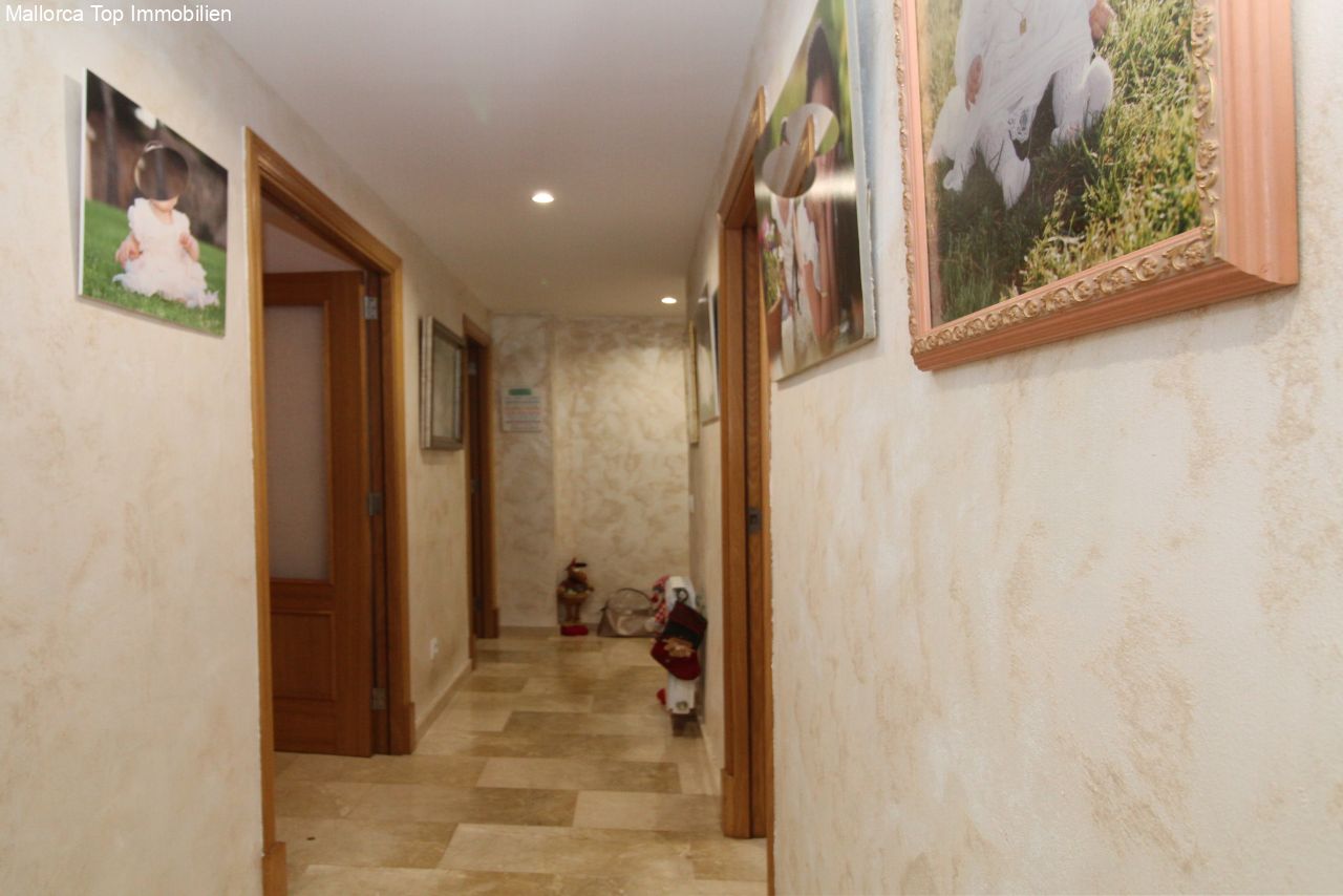 Functional corridor with optimal space utilization and high-quality wooden doors