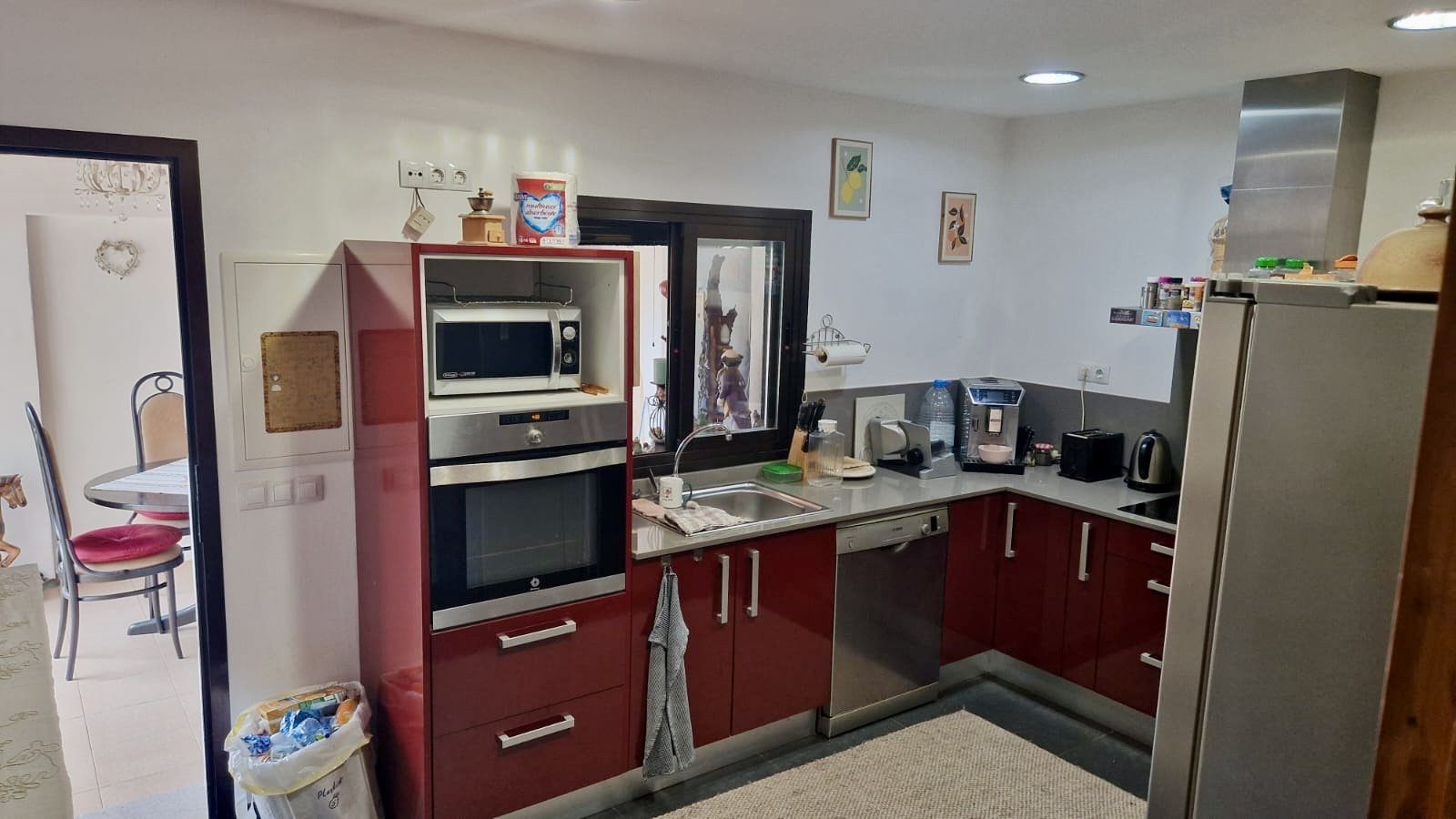 Modern kitchen with high-quality equipment and functional L-shaped layout