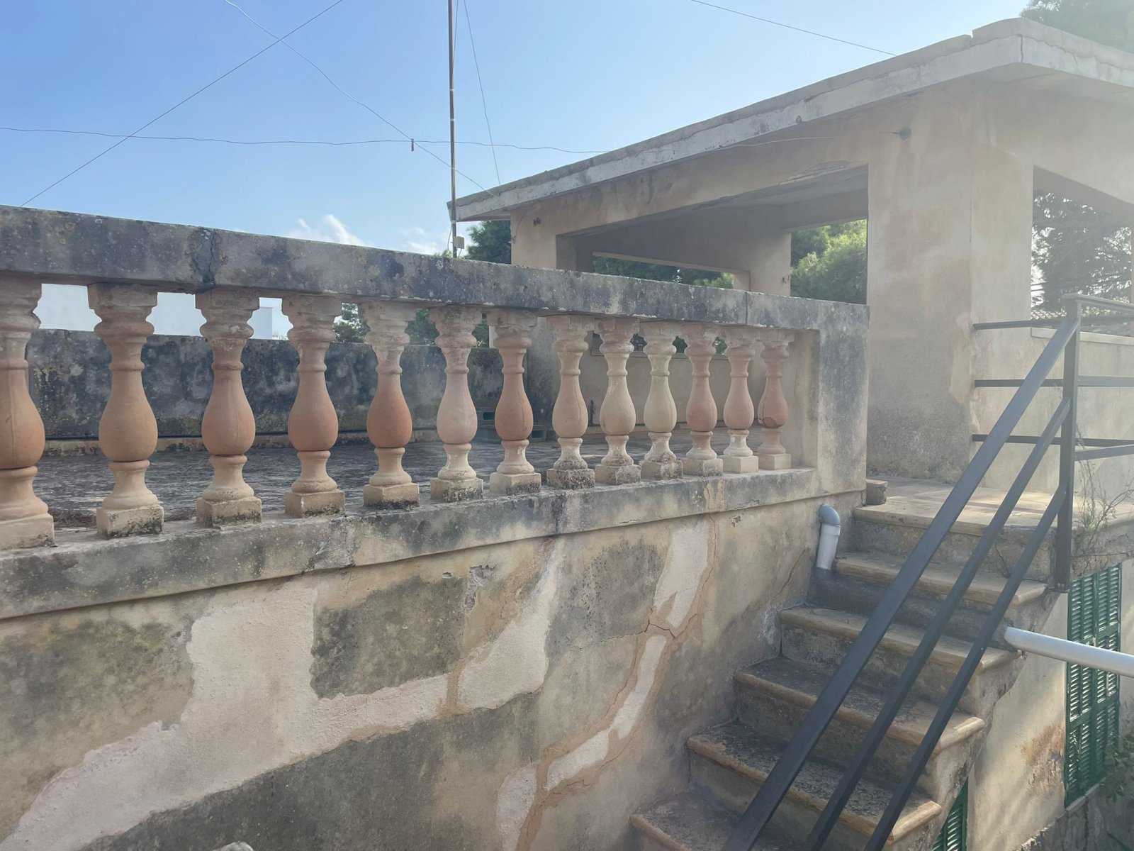 Classic stone balustrade with direct terrace access and view Classic stone balustrade with direct terrace access and view