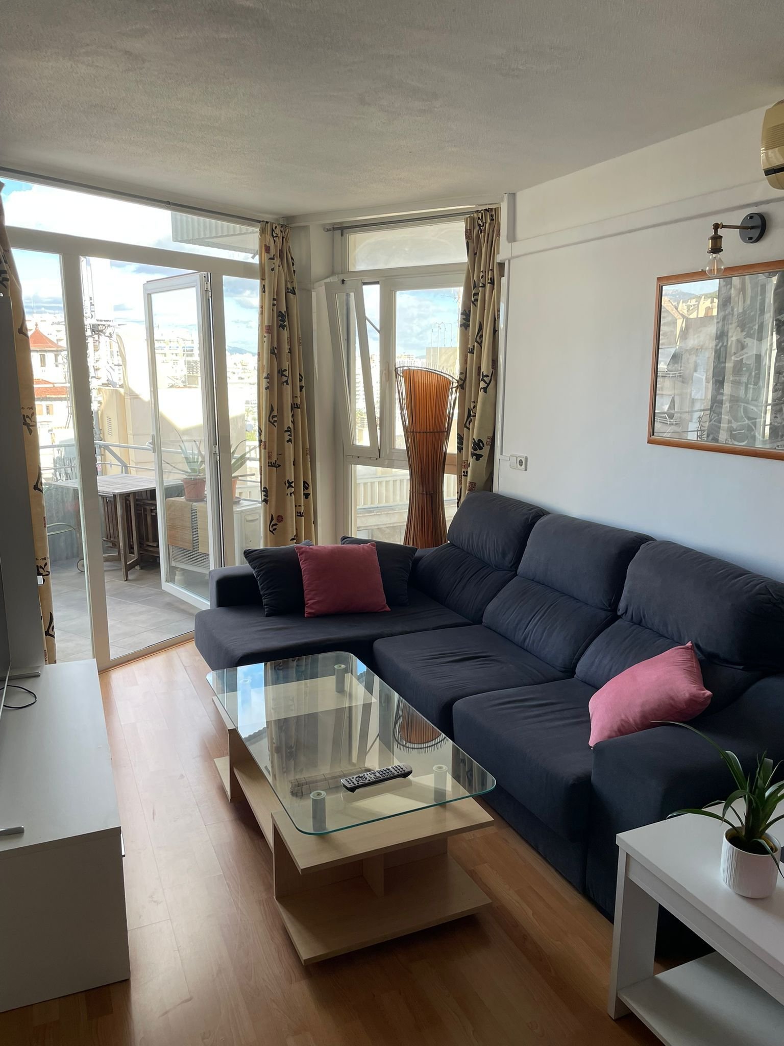 Bright living room with direct balcony access – large window front for maximum brightness Bright living room with direct balcony access – large window front for maximum brightness