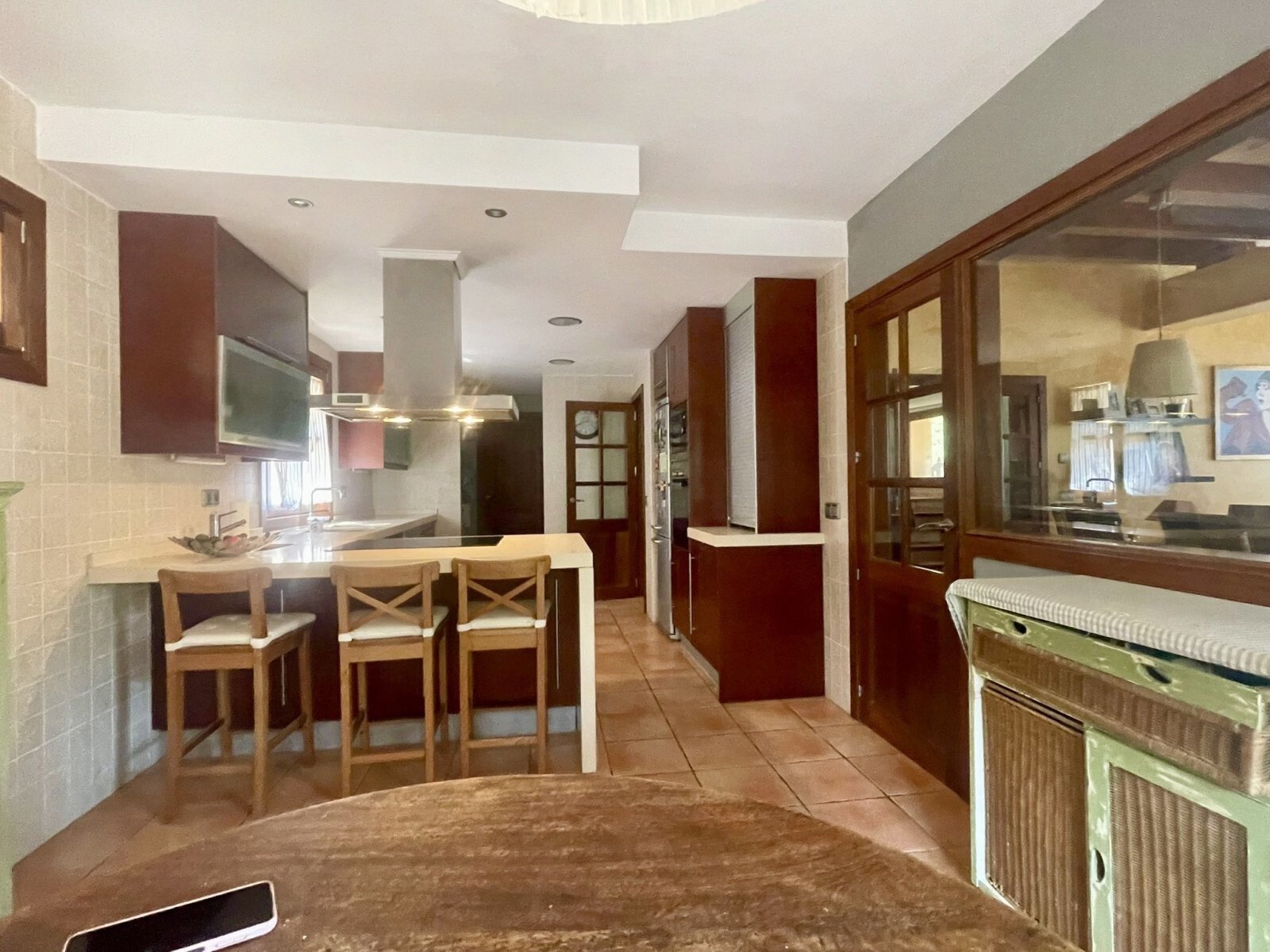 Modern kitchen with a central island and open connection to the living area