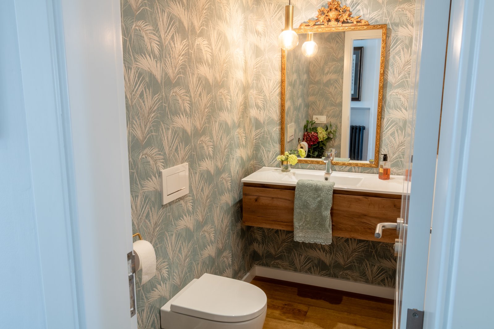 High-quality guest bathroom with double washbasin and LED mirror lighting High-quality guest bathroom with double washbasin and LED mirror lighting