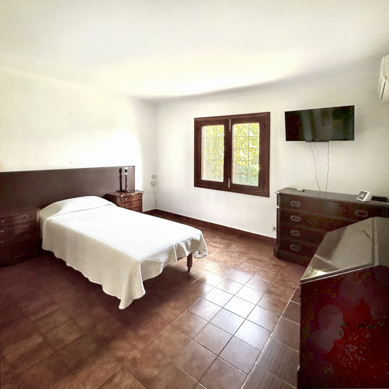 Bright bedroom with terrace access and practical layout Bright bedroom with terrace access and practical layout