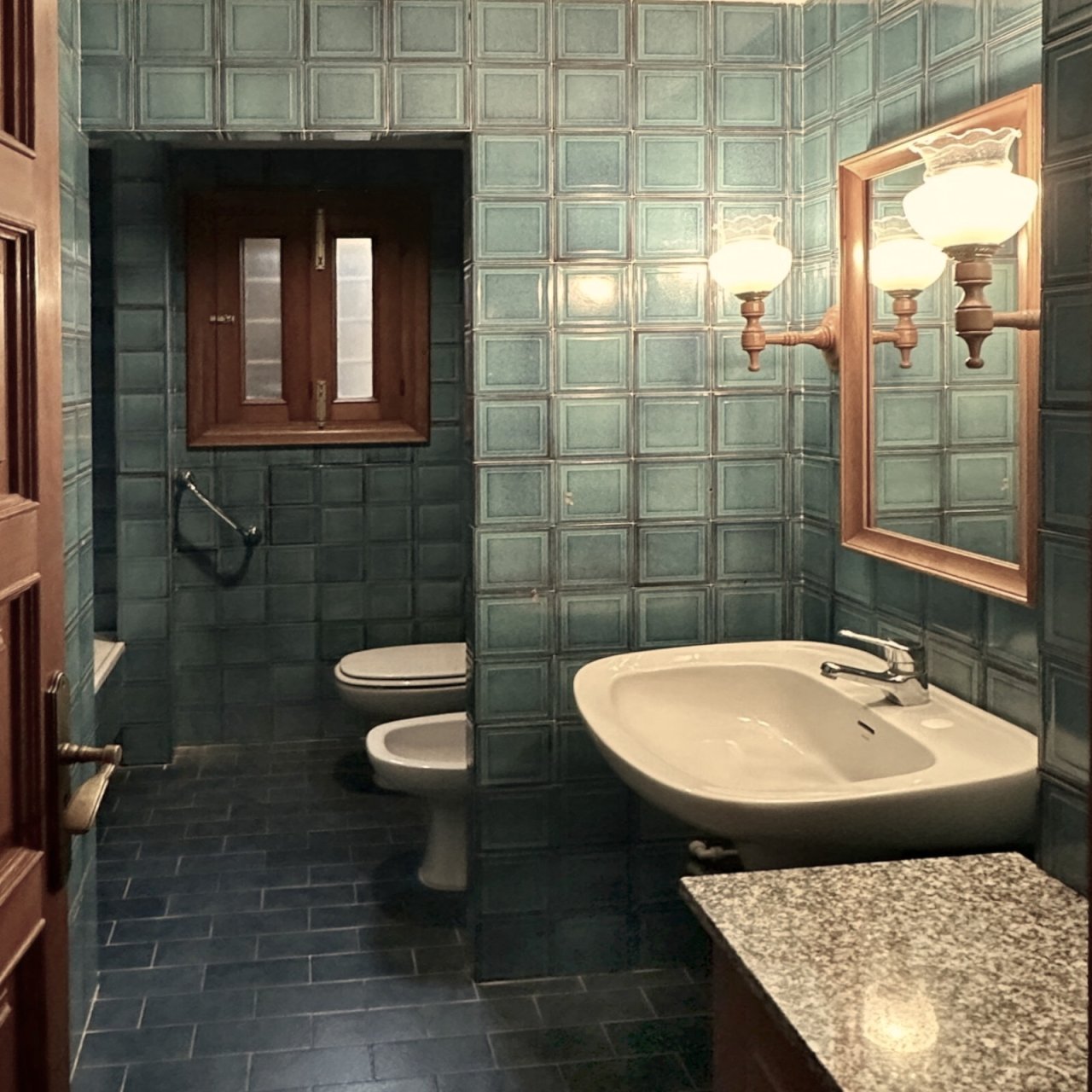 Elegant bathroom with separate shower cabin and large wall design Elegant bathroom with separate shower cabin and large wall design