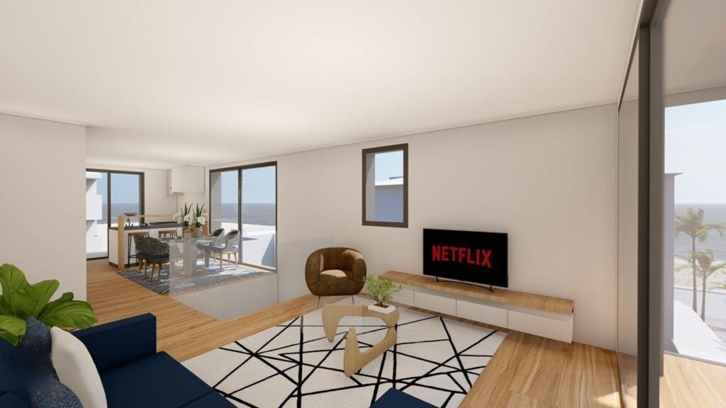Living area with open floor plan and panoramic windows with sea view