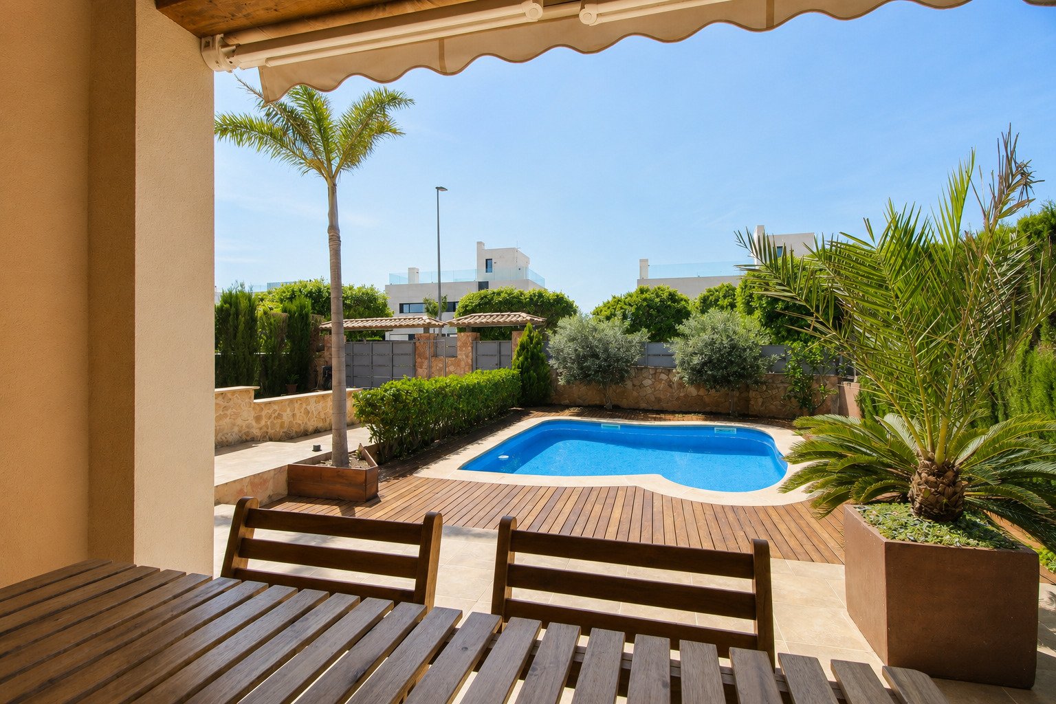 Pool area with covered terrace and sunbed platform Pool area with covered terrace and sunbed platform
