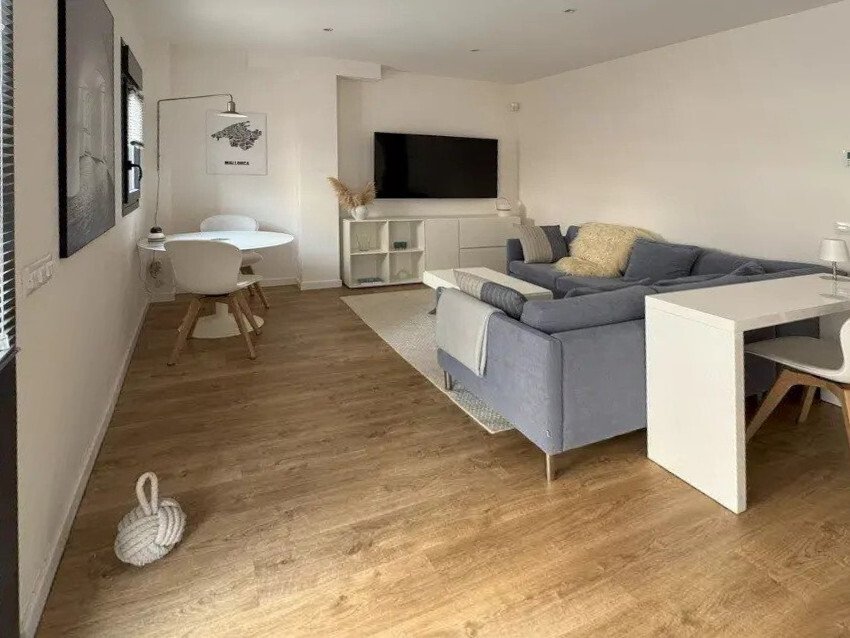 Open living area with flexible space and work corner Open living area with flexible space and work corner