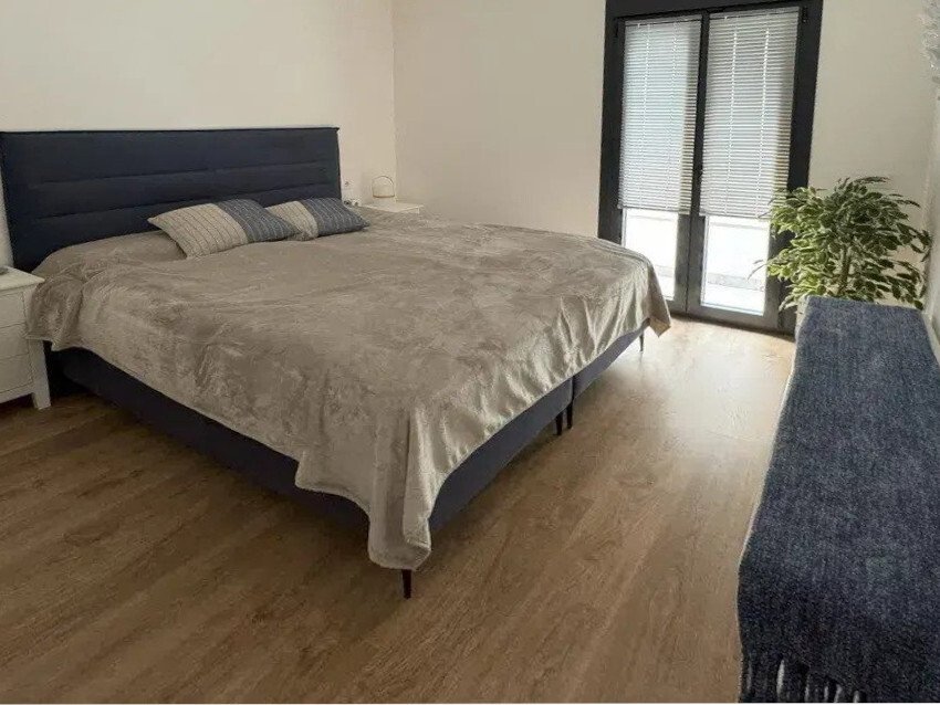 Bedroom with terrace access and high-quality glazing Bedroom with terrace access and high-quality glazing