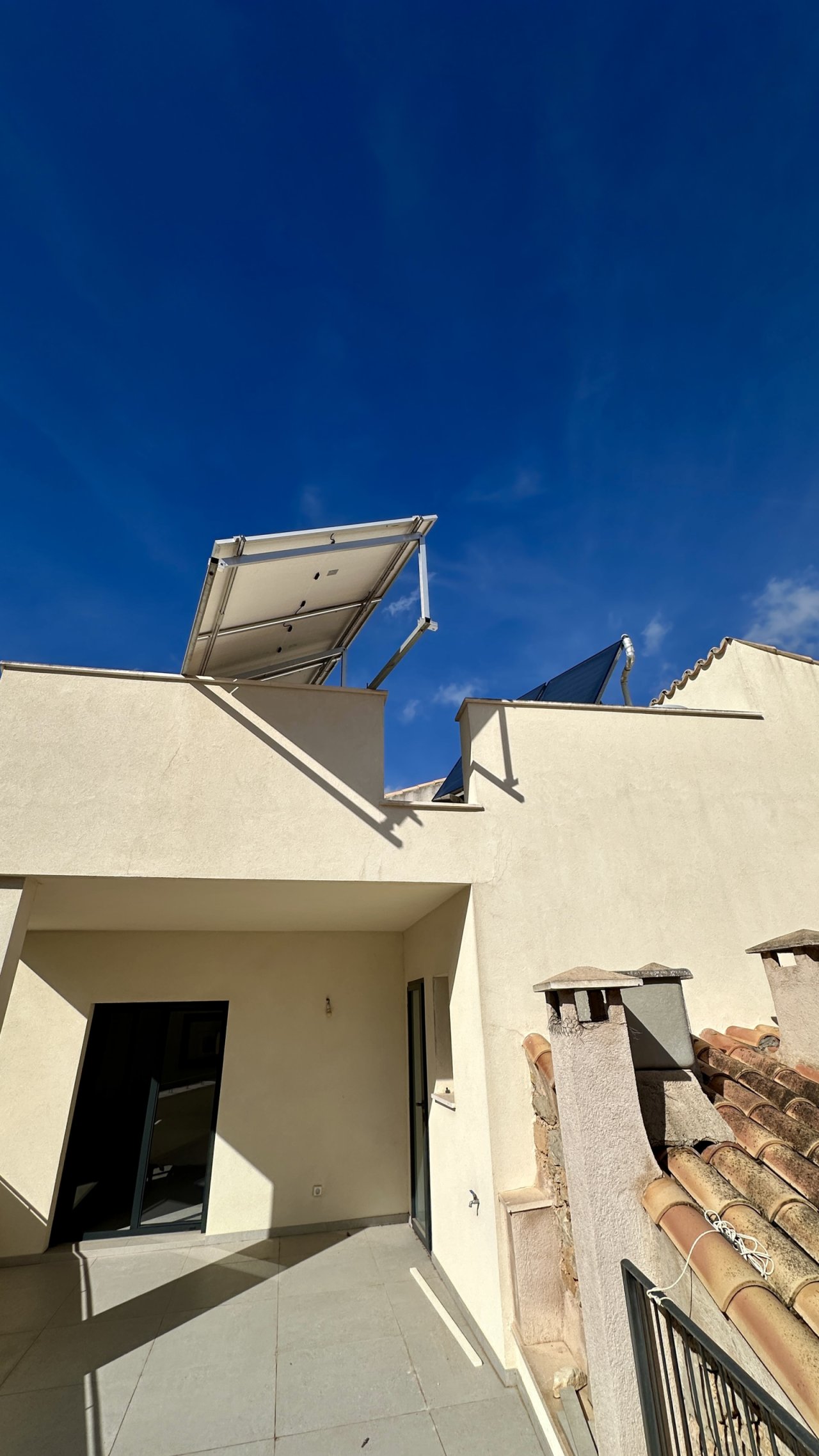 Roof terrace with solar thermal system and modern flat roof system