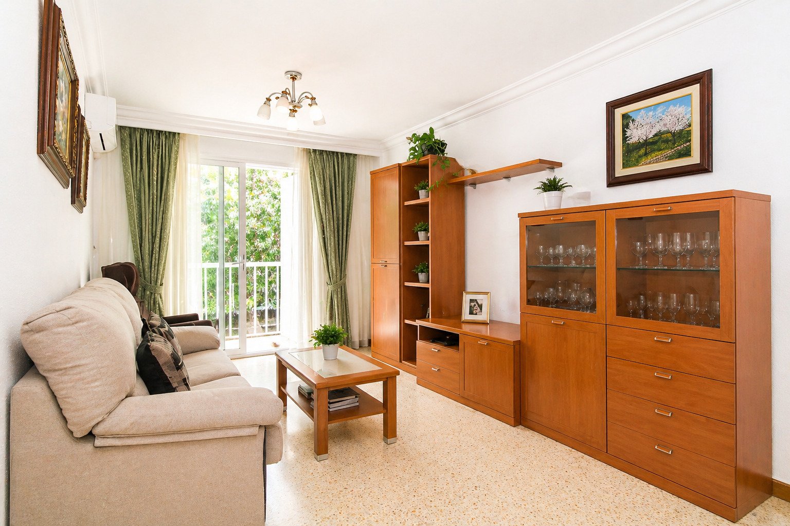 Bright living room with direct balcony access and optimal space utilization Bright living room with direct balcony access and optimal space utilization