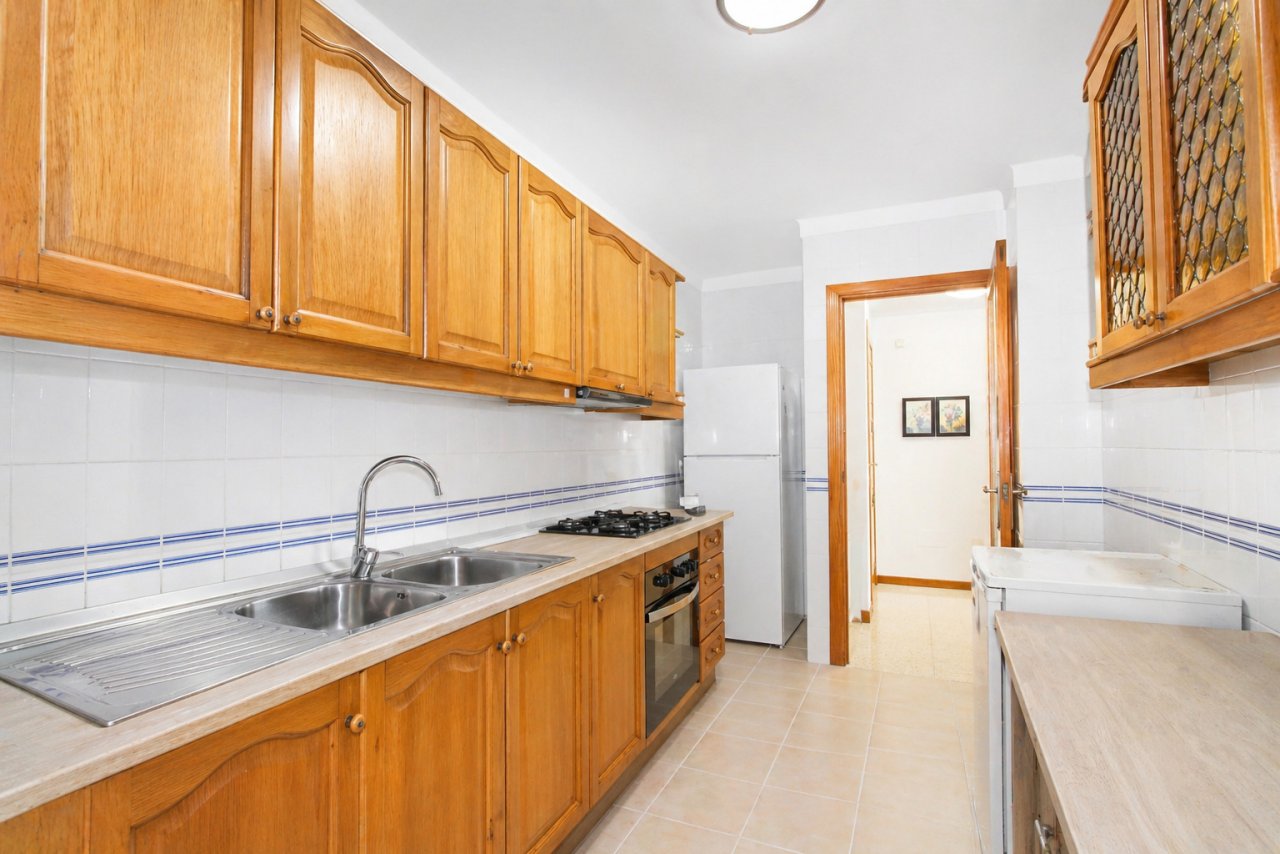 Thoughtfully designed kitchen with a practical pantry and optimal workflow Thoughtfully designed kitchen with a practical pantry and optimal workflow