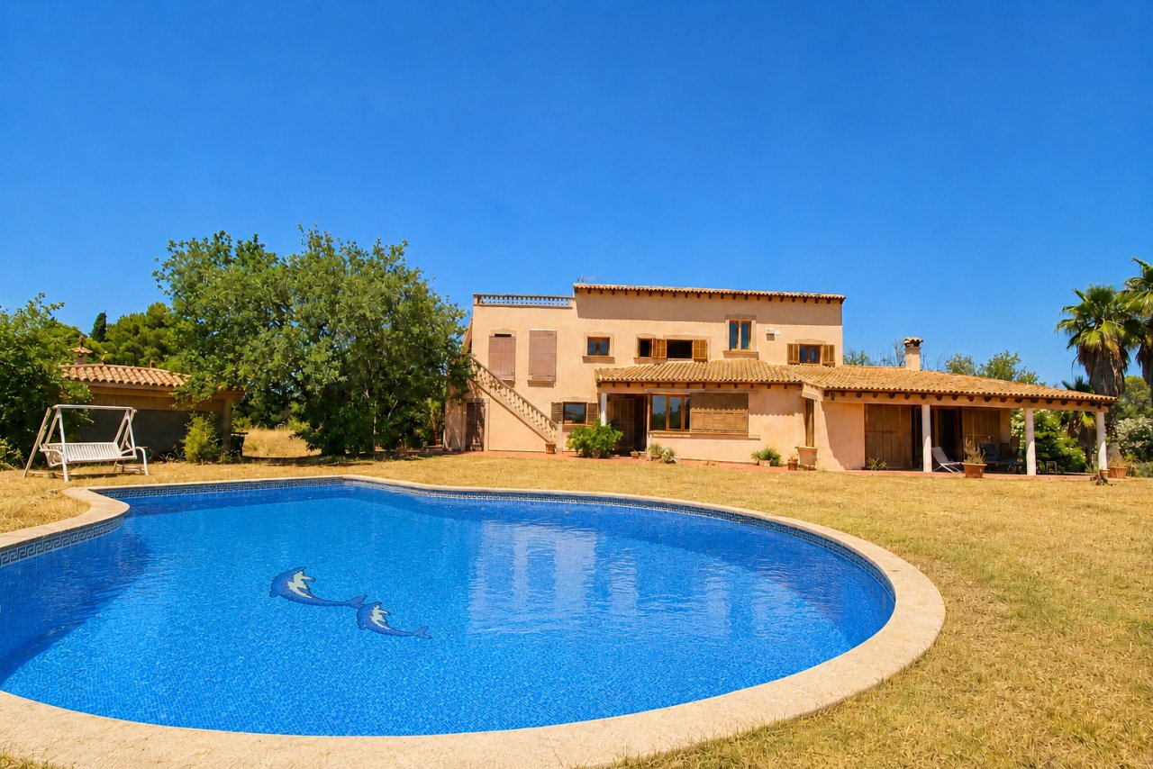 Elegant pool area with heated pool and spacious garden landscape Elegant pool area with heated pool and spacious garden landscape
