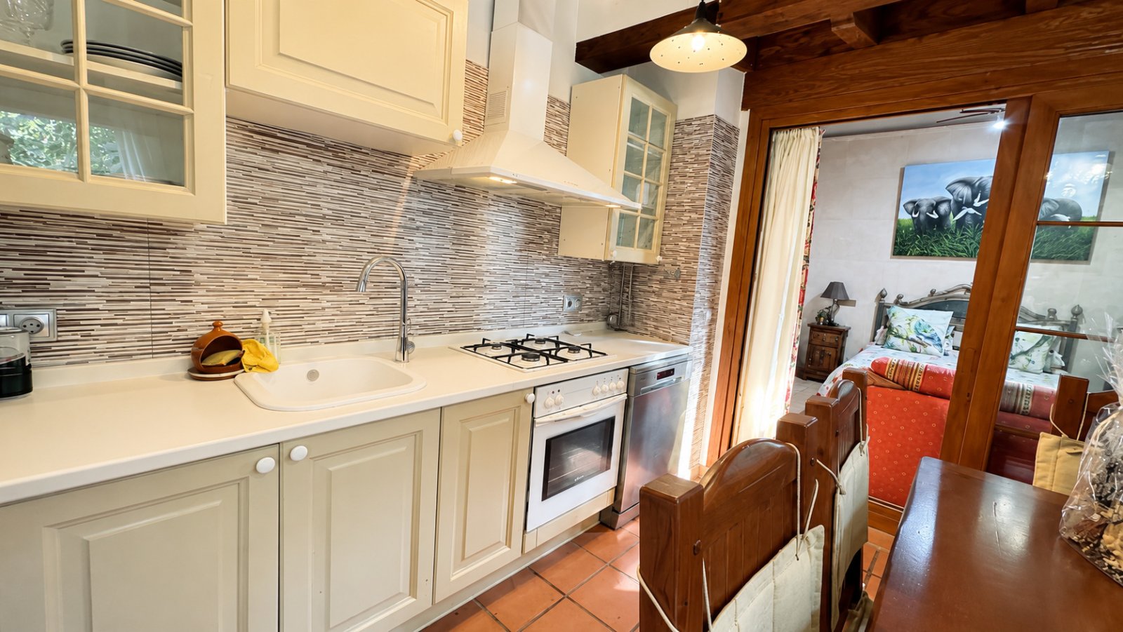 Modern kitchen with high-quality built-in appliances and seamless transition to the living area Modern kitchen with high-quality built-in appliances and seamless transition to the living area