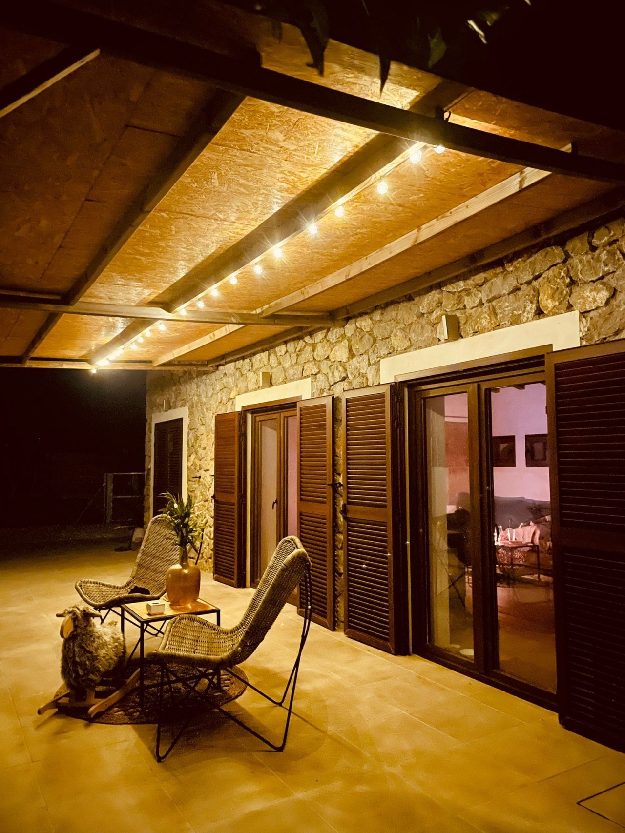 Covered terrace with integrated LED lighting and direct access to the living rooms Covered terrace with integrated LED lighting and direct access to the living rooms