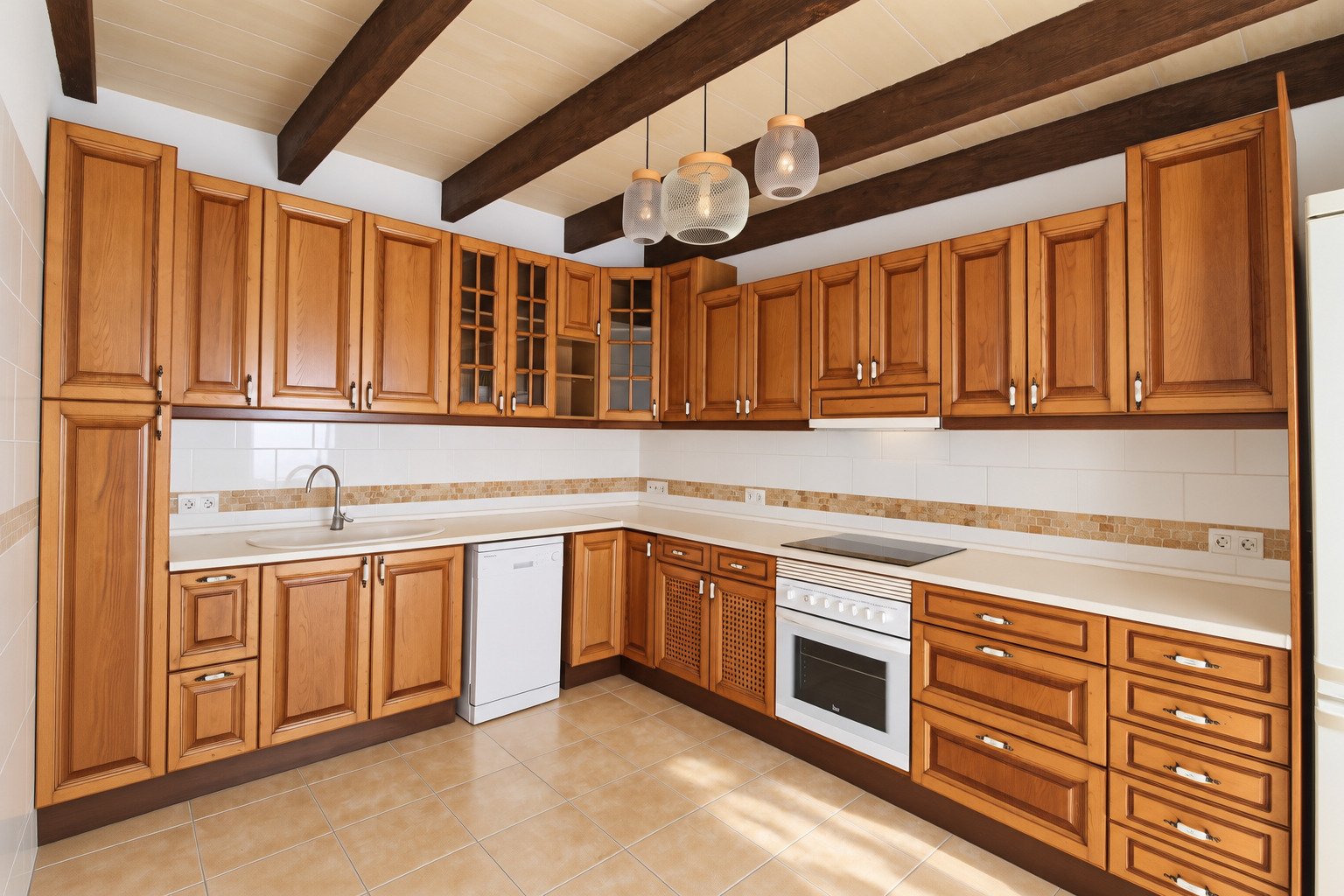 High-quality fitted kitchen with thoughtful layout and plenty of storage High-quality fitted kitchen with thoughtful layout and plenty of storage