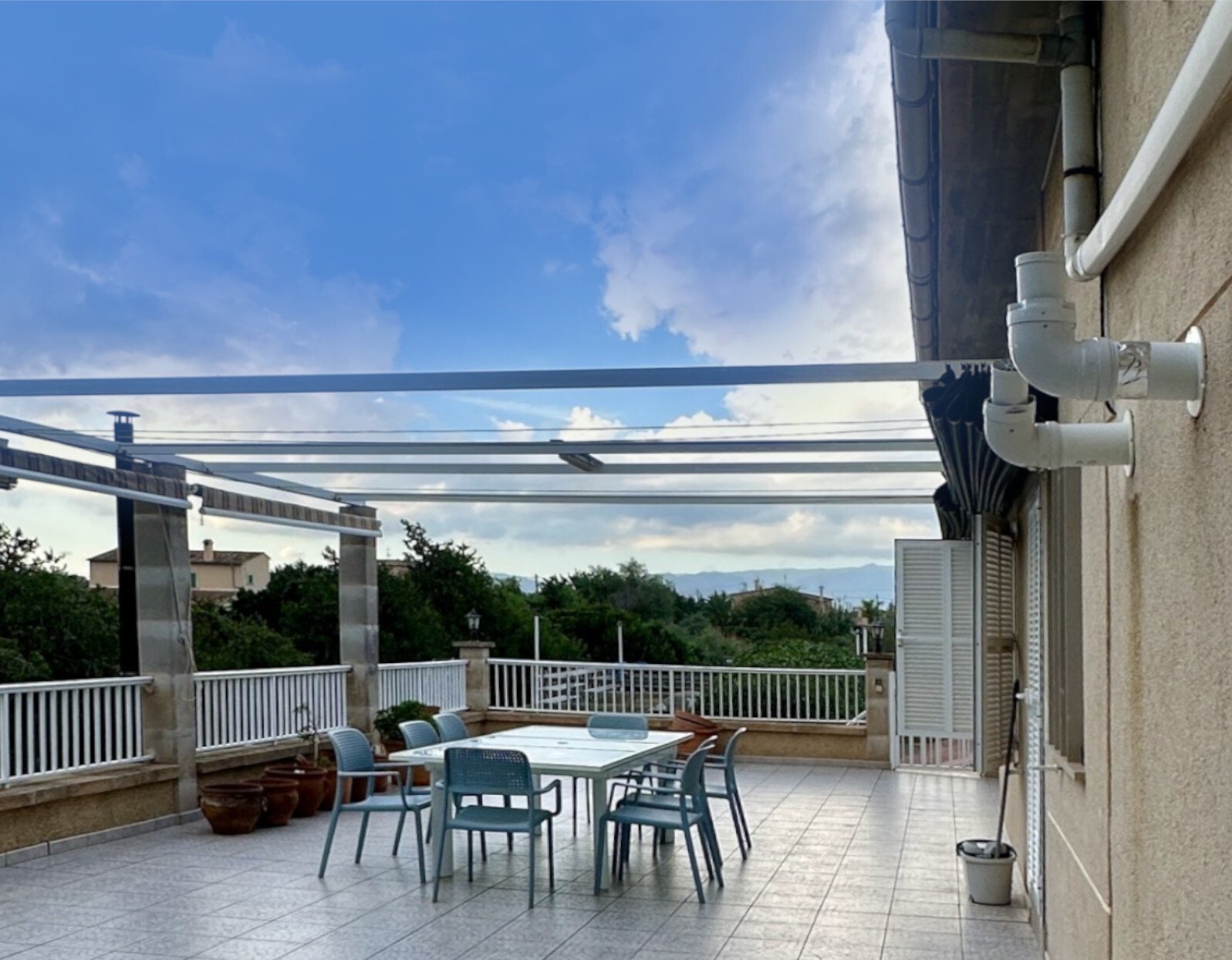 Exclusive rooftop terrace with pergola cover and panoramic view of the landscape