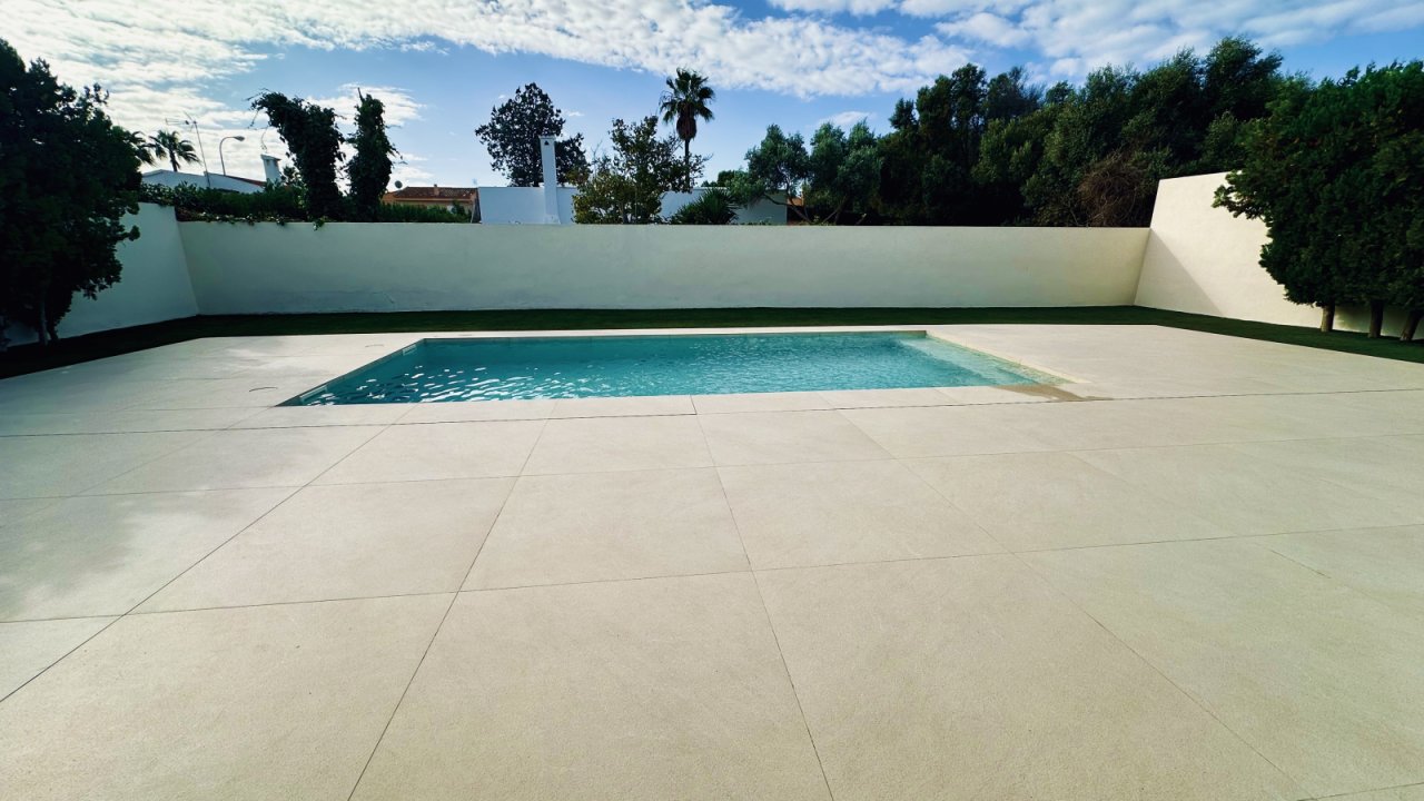 Private pool area with spacious terrace and high-quality edging Private pool area with spacious terrace and high-quality edging