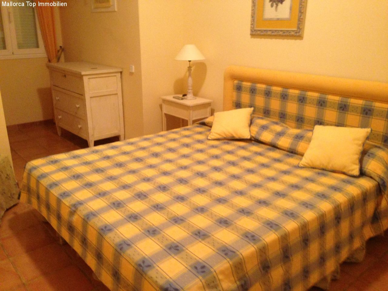 Comfortable bedroom with practical layout and ample storage space.