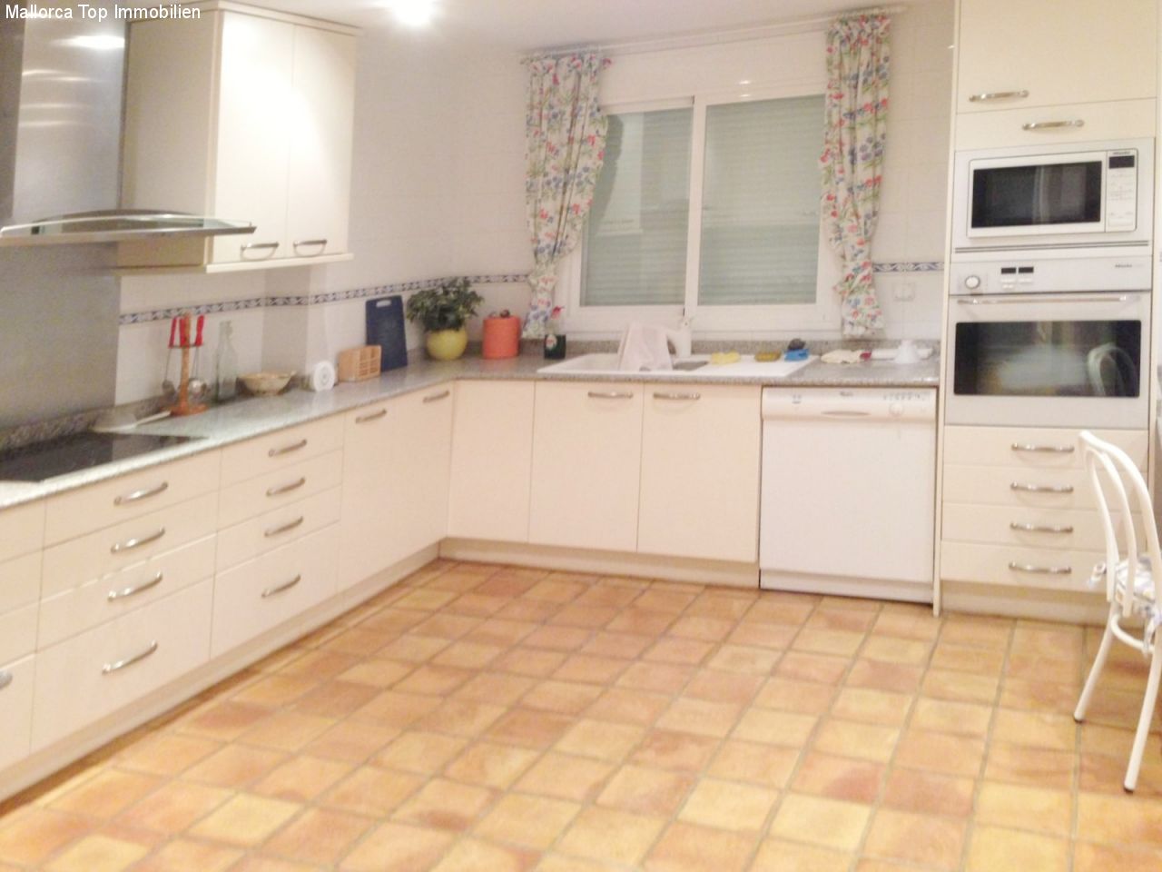 Modern kitchen with high-quality equipment and optimal workspace layout