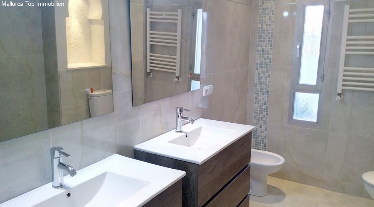 Modern bathroom with double sink and walk-in shower Modern bathroom with double sink and walk-in shower