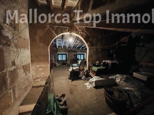 Authentic passage area with a barrel vault and rustic stone walls Authentic passage area with a barrel vault and rustic stone walls