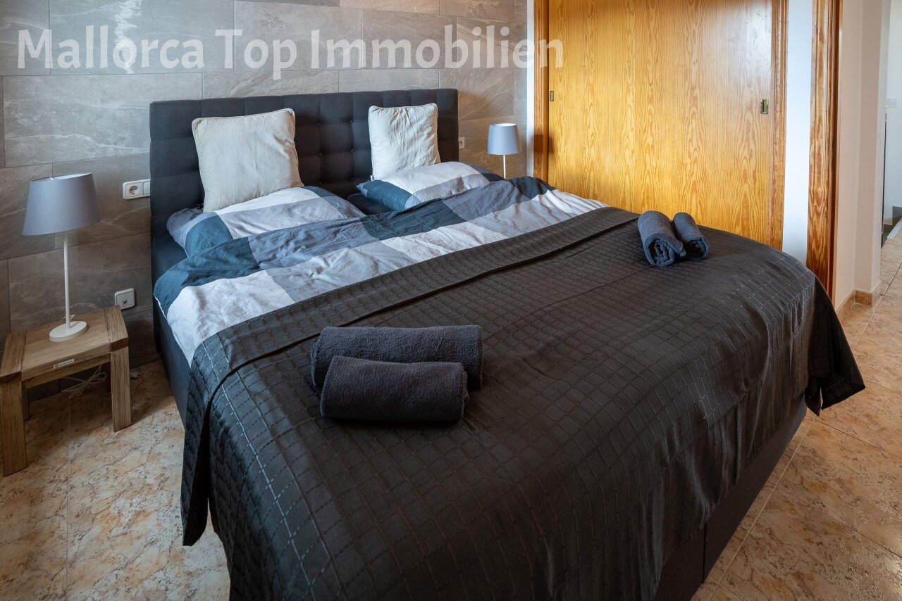 Main bedroom with walk-in closet and high-quality furnishings