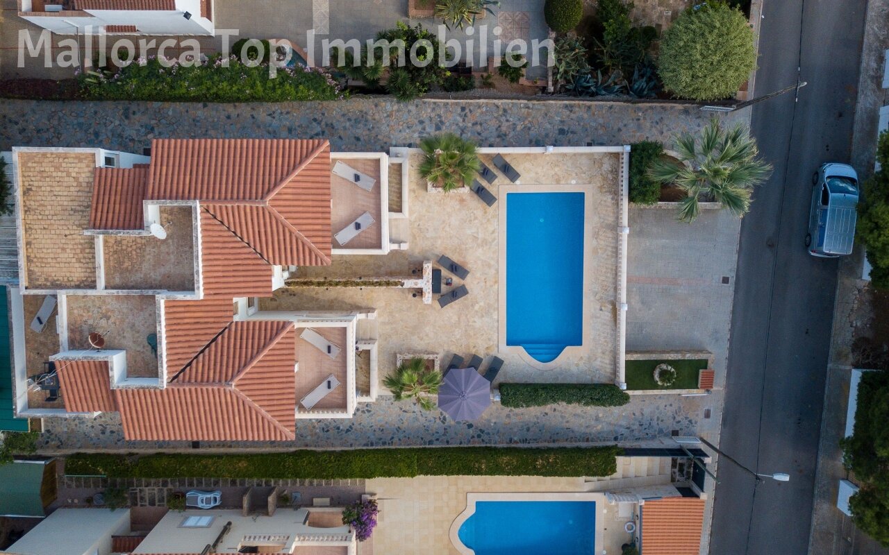 Aerial view: Well-structured estate with pool, terraces, and smart layout