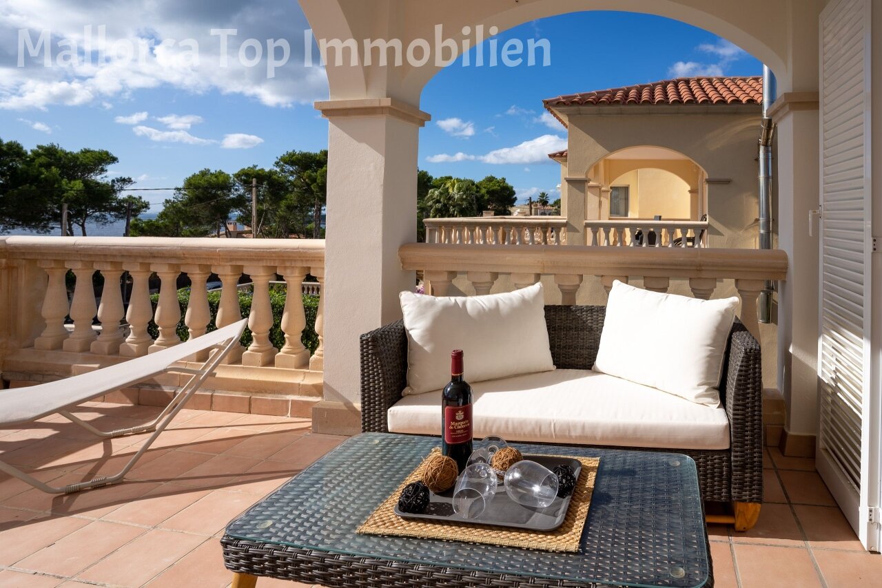 Sea view terrace with elegant column arcades and covered loggia area