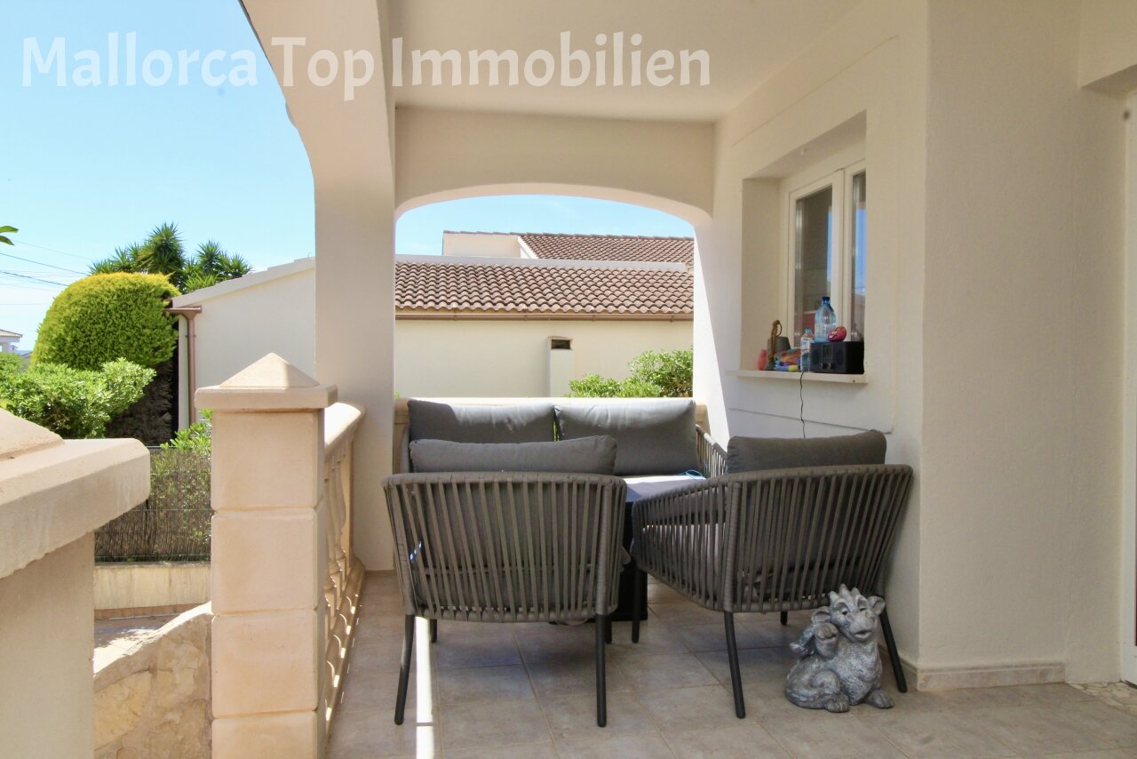 Covered terrace with elegant column architecture and direct sea view Covered terrace with elegant column architecture and direct sea view
