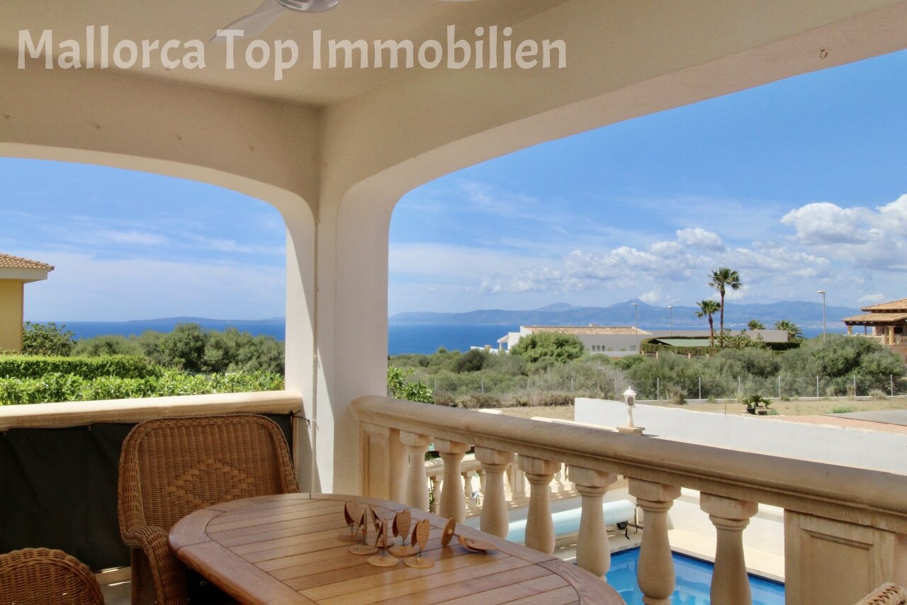 Covered loggia with sea view and elegant column architecture Covered loggia with sea view and elegant column architecture
