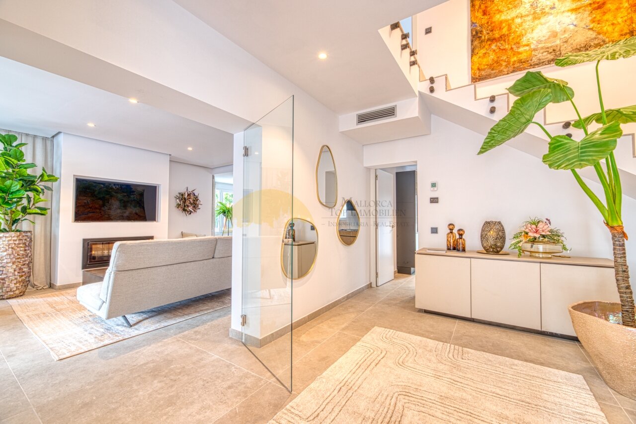 Open floor plan with seamless transitions and high-quality furnishings
